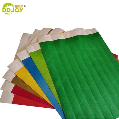 Braccialetti Tyvek semplici in arancione 100 pcs per Event Party Supplies Logo OEM personalizzato