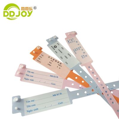Braccialetto usa e getta di plastica medica arancione per sistema di identificazione ospedaliero personalizzato