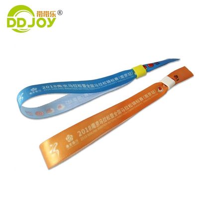 Braccialetti RFID stampati su misura in tessuto satinato arancione per l'evento e l'accesso
